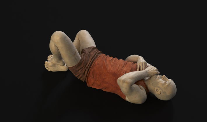 Andrew Lying down in Brown Shorts